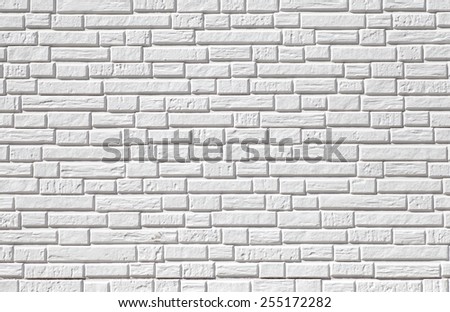The modern white concrete tile wall background and texture