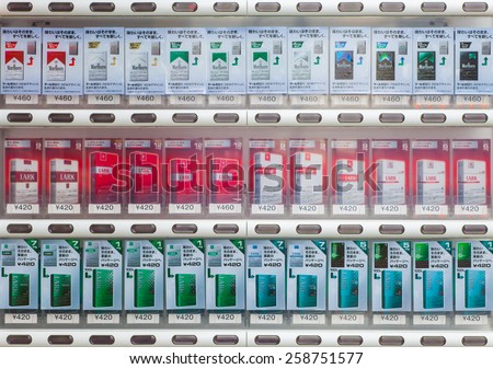 Tokyo  JAPAN - March 04 : Cigarette vending machine in Tokyo , Japan On March 04, 2015. People can buy a pack of cigarette by inserting the I.D. card with money into the machine