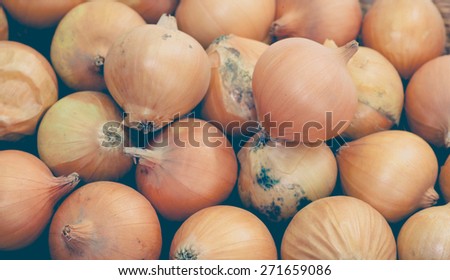Close - up Pile of small gold onion