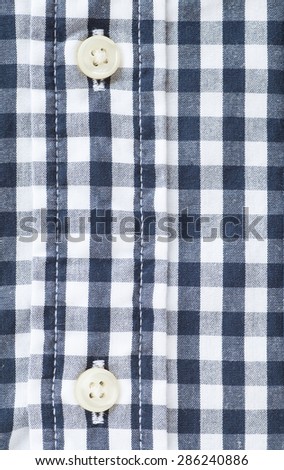 close - up Button and check shirt fabric pattern and background