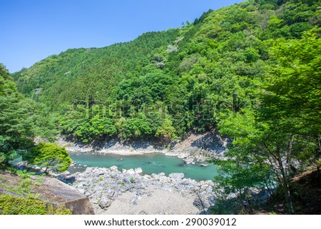 Green mountain and river in summer season at Arashiyama , Kyoto