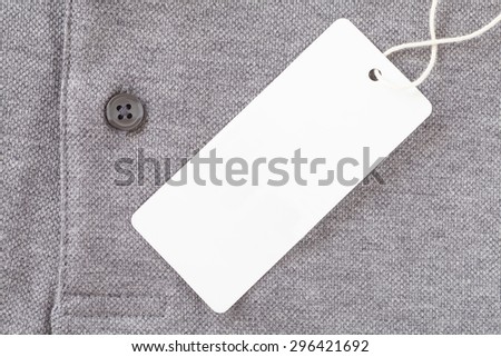 Close - up Blank tag label on grey shirt