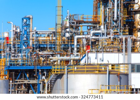 Blurred background of Industrial view at oil refinery plant form industry zone