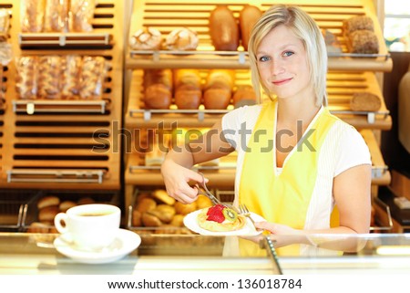 Bakery shopkeeper preparing coffee and cake for customer