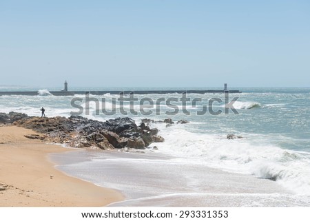 Atlantic Ocean coastline with lighthouses in the background