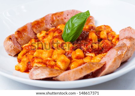 italian pasta gnocchi with fresh Italian pork sausage in spicy tomato sauce