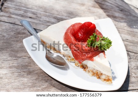 delicious strawberry cheese cake on a white plate