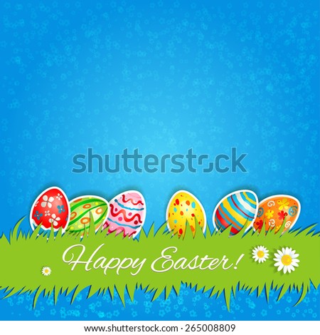 Multicolor eggs and green grass. Holiday Easter card with place for text.