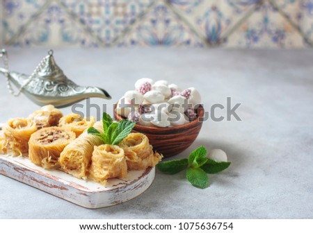 Traditional arabic dessert Baklava with honey and nuts. Selective focus