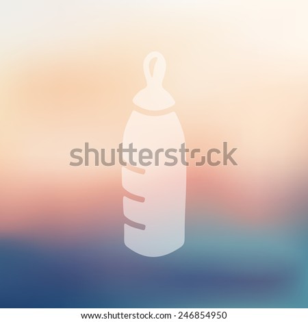 baby bottle icon on blurred background