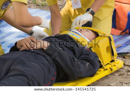 Phrae,Thailand - December 20 : Unidentified Men Are First Aid Training From Staff The Hospital On December 20, 2012 At Local Parks, Muang, Phrae, Thailand.