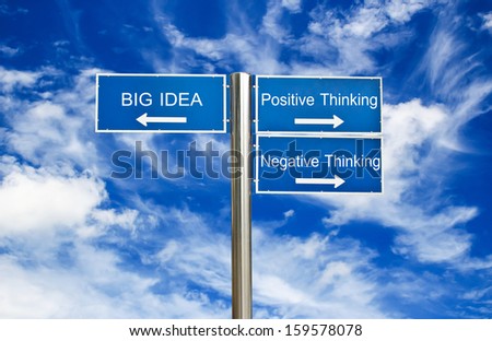 Big idea,Positive thinking,Negative thinking concept on sign road with blue sky background