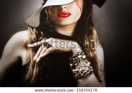Sexy Young Pretty Woman / Model With Red Lips, Vintage / Retro Hat And Jewelry Is Sending A Kiss / Smooch - Closeup