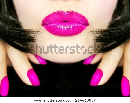 Sexy pretty woman with black hair, pink lips sending kiss smooch