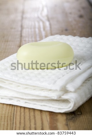Close up of a white towel and green soap
