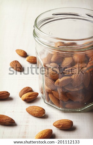 Almonds in mason jar and space for text