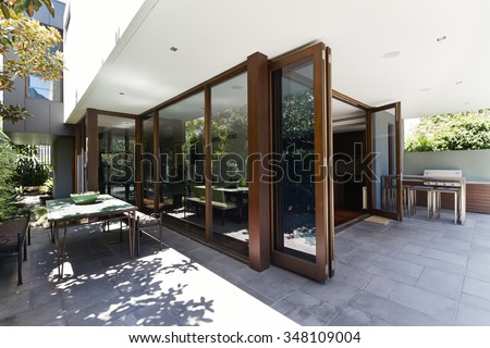Bi fold doors opening to rear courtyard of contemporary Australian home