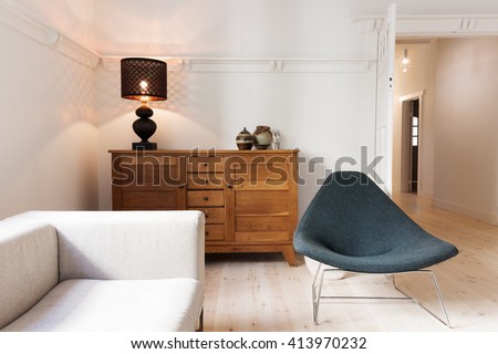 Side board buffet chair and lamp in a luxury apartment renovation in Australia
