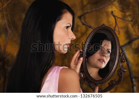 beautiful woman with the mirror