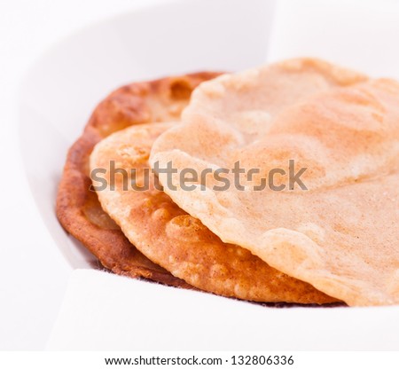 A dish containing Naan bread