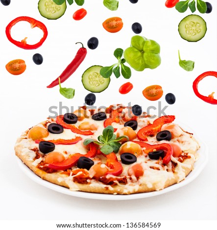 Pizza with  flying vegetables
