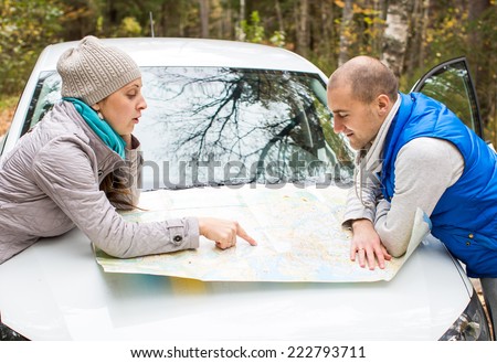 Travel - family with camping car on the road