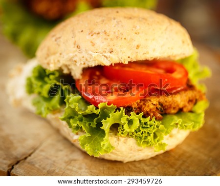 Homemade Healthy Vegetarian Quinoa Burger with Lettuce and Tomato