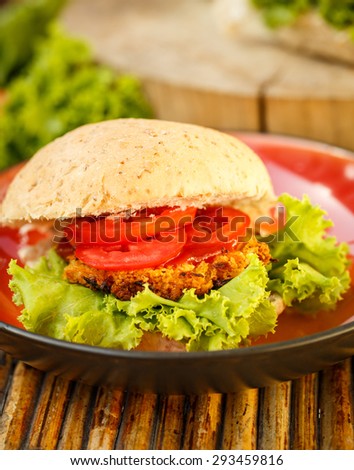 Homemade Healthy Vegetarian Quinoa Burger with Lettuce and Tomato