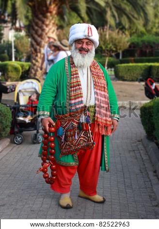 ISTANBUL, TURKEY - SEPTEMBER 19: Unidentified man in Nasreddin Hodja costume September 19, 2010 in Istanbul, Turkey. Nasreddin is a very popular character in Turkey.