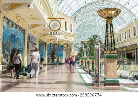 MANCHESTER, UK - JUNE 19, 2015: Peel avenue in the Trafford Shopping Centre. The Trafford Centre is large indoor shopping centre and leisure complex in Greater Manchester, England. Area - 185,000 sqm.