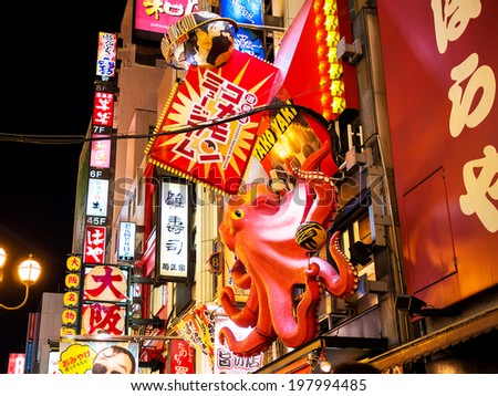 OSAKA, JAPAN - NOVEMBER 30: Japanese Billboard sign in Osaka, Japan on November 30, 2012. Famous for illuminated creative billboards along Dotonbori street where tourist can spend colorful night life