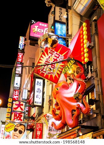 OSAKA, JAPAN - NOVEMBER 30: Japanese Billboard sign in Osaka, Japan on November 30, 2012. Famous for illuminated creative billboards along Dotonbori street where tourist can spend colorful night life
