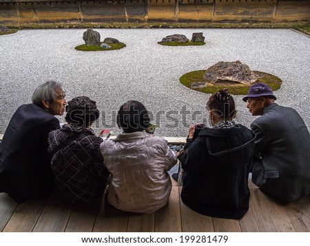 KYOTO, JAPAN - NOVEMBER 29: Ryoanji in Kyoto, Japan on November 29, 2012. A Zen Rock Garden in Ryoanji Temple in a garden with fifteen stones on white gravel