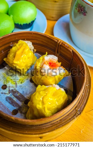 Chinese steamed food in bamboo containers traditional, Pork dumplings