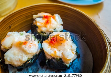 Chinese steamed food in bamboo containers traditional, Minced Shrimp Dumpling