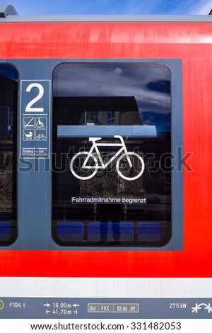 FUSSEN, Germany - March 29, 2015: One of the cabinet indicates that the train can bring your bike on, supporting the use of clean energy, energy conservation and the environment and tourism.