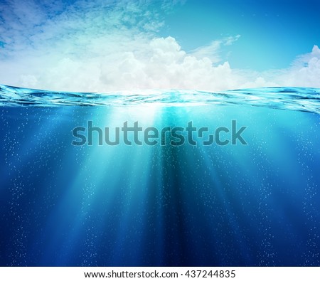 Underwater or under the sea Beauty turquoise sea, In view of the sky bright atmosphere with some clouds.
