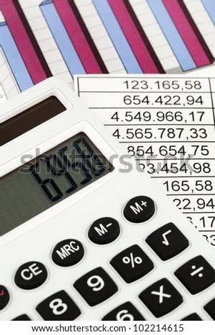 a calculator and various statistics in the calculation of the balance sheet, revenue and profit.