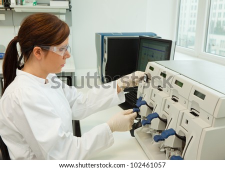 a woman in laboratory research. research in the research laboratory.