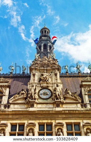 the city hall (hotel de ville) in paris, france. at the edge of a beautiful place