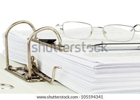 a file folder with documents and documents. retention of contracts.