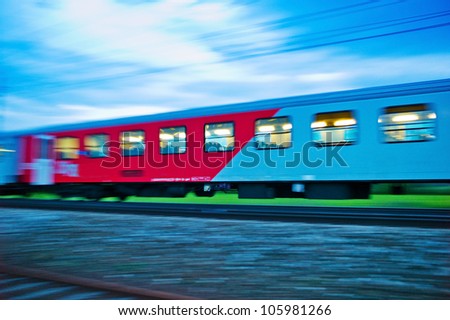a passenger train travels through the night. night train with people of the Ã?Â?Ã?Â¶bb