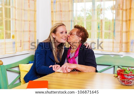 a granddaughter to visit his grandmother. hugs and kisses