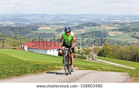 senior fitness training and riding a bicycle on a road bike