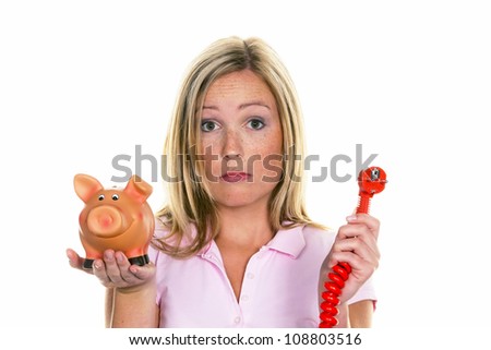 a young woman holding a piggy bank and a power plug. photo icon for energy cost