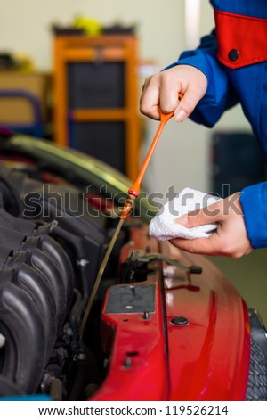 oil pressure is measured in the car. with the dipstick is the correct oil level checked