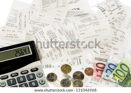 calculator, receipts and money symbol photo for savings, purchasing power and inflation