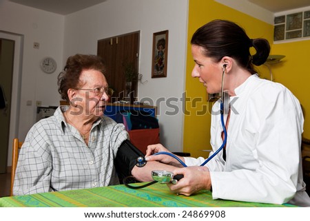 Old woman and nurse the sick in nursing home