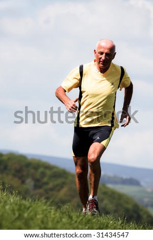 Elderly joggers trained for his fitness with jogging