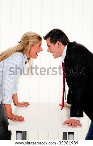 Dispute among employees at work in an office